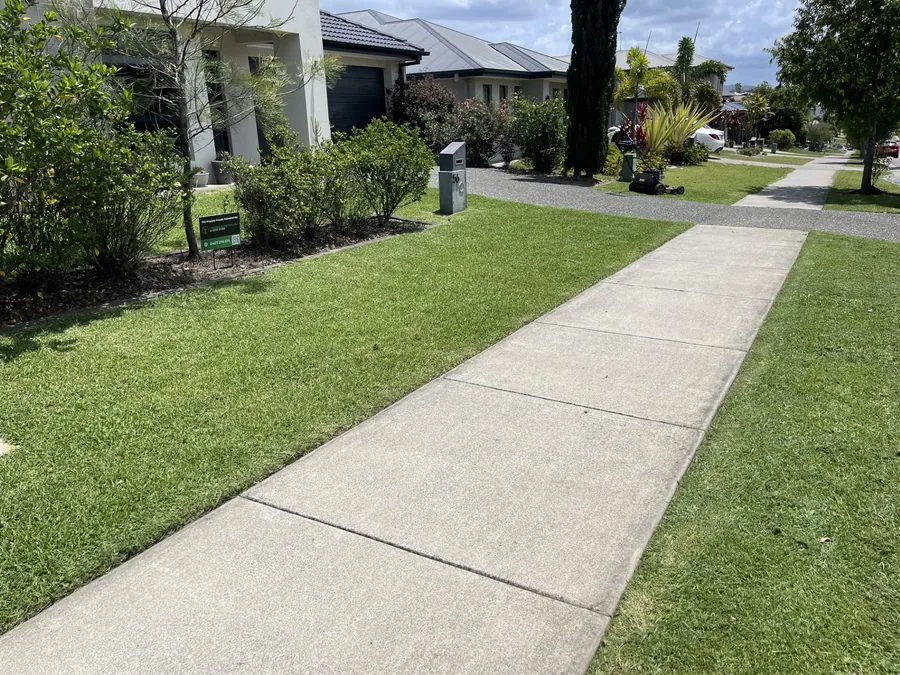 Street verge mown on a new estate — body corporate and estate grounds maintenance Gold Coast